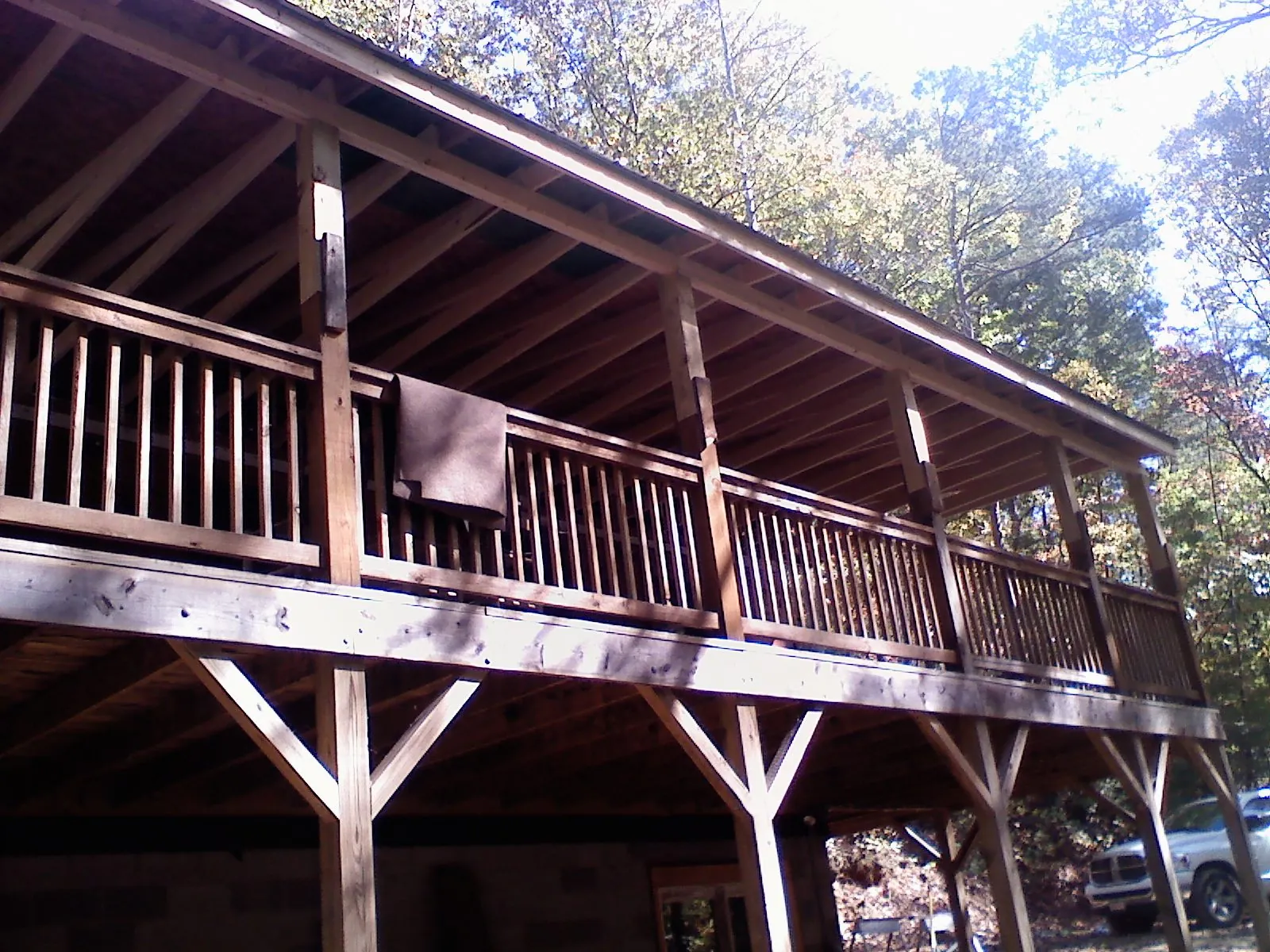 Timber framing under a new elevated porch and deck — Roof Leak Repair in Acton by Roofing Brothers